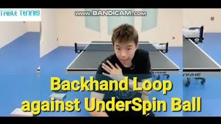 Table Tennis. Backhand Looping against Underspin ball. 乒乓反手拉下旋球。