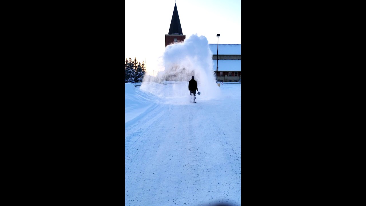 Throwing boiling water into freezing cold air to create water vapor