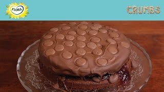 Claire and lucy whip up what they humbly refer to as "the world's
best" chocolate cake -- sandwiched with jam, iced melted completely
cove...