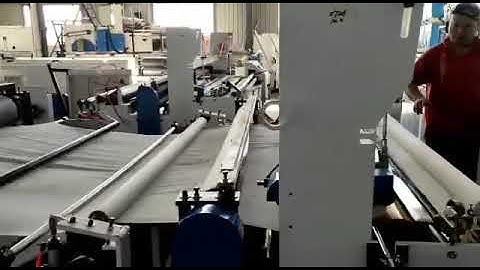 Automatically embossed coreless toilet tissue paper roll rewinding machine WhatsApp +8618339233758