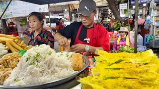 Cambodian street food  Delicious yellow pancake, spring rolls, noodles @Toul Tom Pong Market