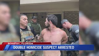 Person of interest in double murder investigation in custody