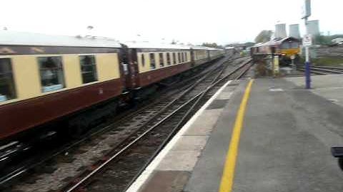 35028 Clan Line leaving Didcot Parkway on a VSOE duty as a DBS 66 arrives