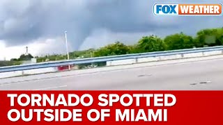 Tornado Spotted Outside Miami Flips Semi-truck, Injures One