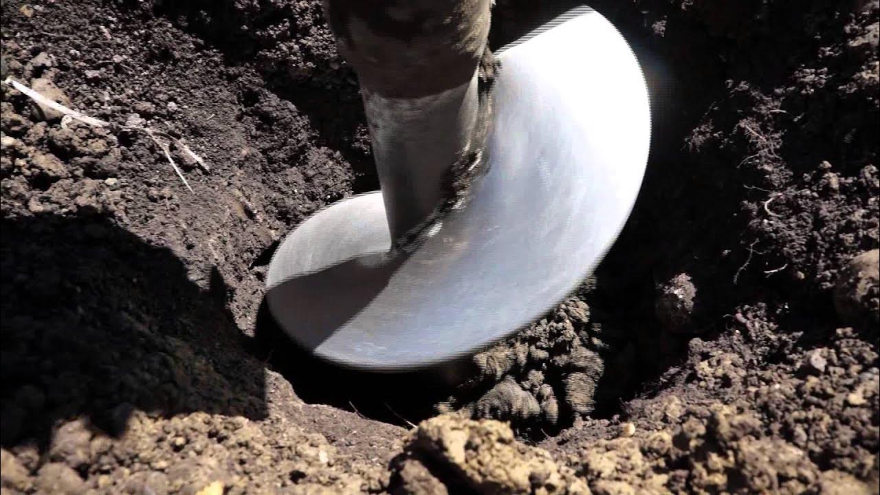 Digging and drilling. Earth digging drill. hole digger. underground rock drilling. drilling rear hole.
