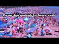 Coronavirus pandemic but huge crowds in uk bournemouth beach dorset england