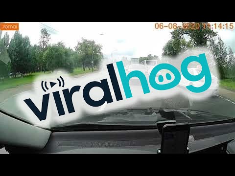 Close Call as Woman Falls While Crossing Street || ViralHog