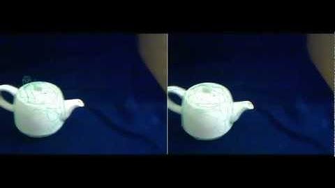 Model-based tracking of rigid curved surfaces