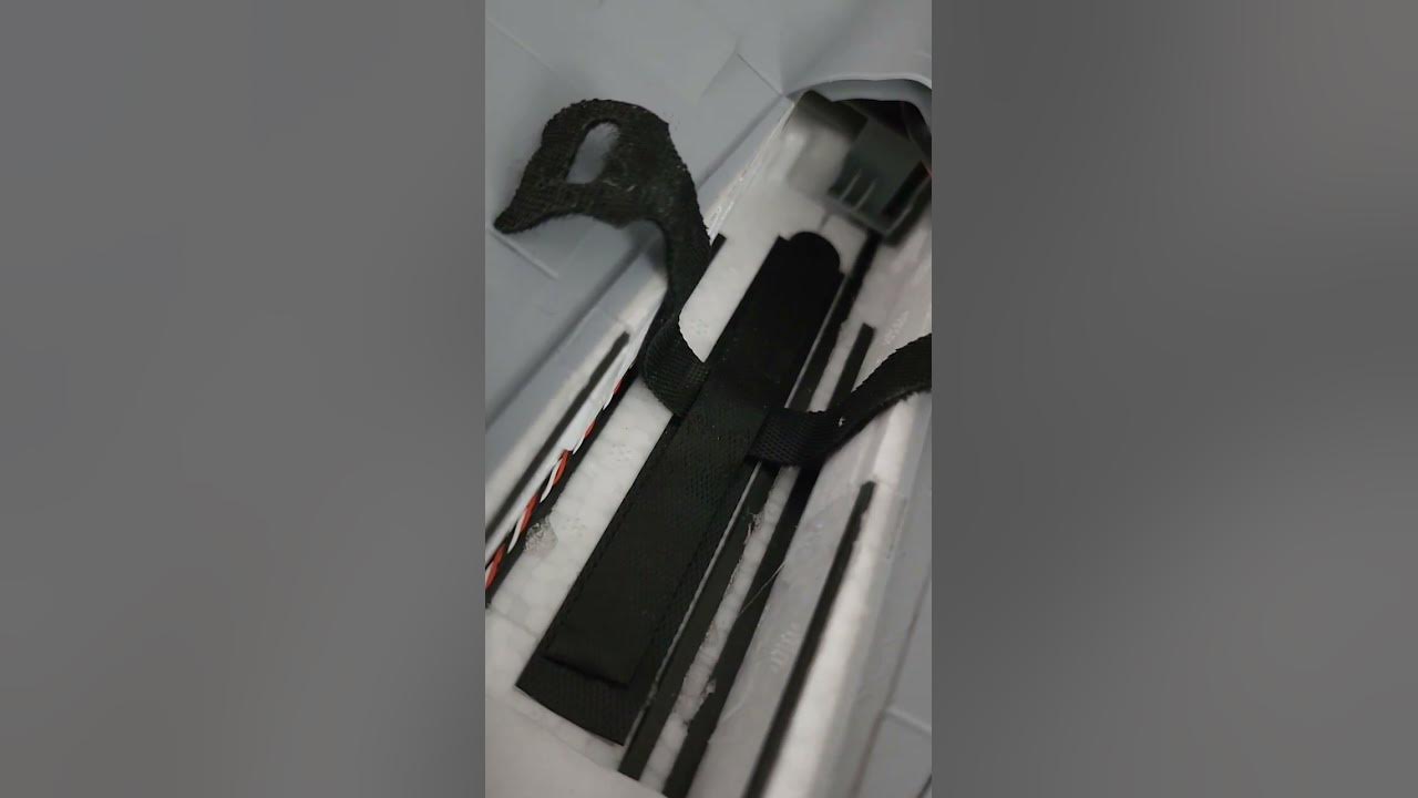 Eflite F14. Decided to add a battery strap to the fuselage. Fortunately