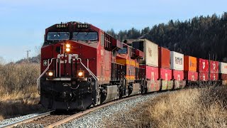 CP stack train with KCSM Grey ghost in middle Westbound at Edworthy Park on the Laggan subdivision.