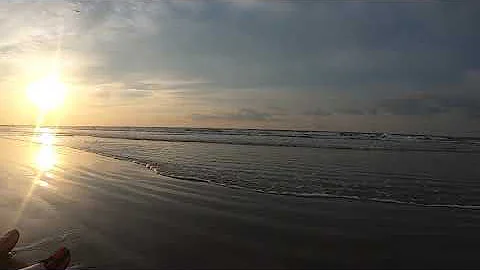 Lesa and Allen Haynie relaxing Galveston sunrise 5...
