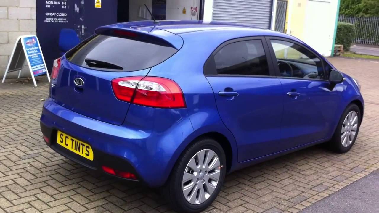 Kia Rio with medium tints on all rear windows - YouTube