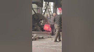 Forge this giant rectangular iron block at high temperature. Dangerous forging