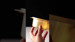 Gold 5-compartment container, perfect for showcasing nuts.