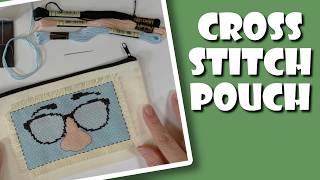 Decorate a plain pouch with cross stitch