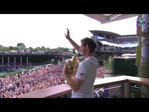 Andy Murray shows off his second Wimbledon trophy