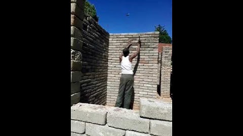 Building with interlocking blocks.