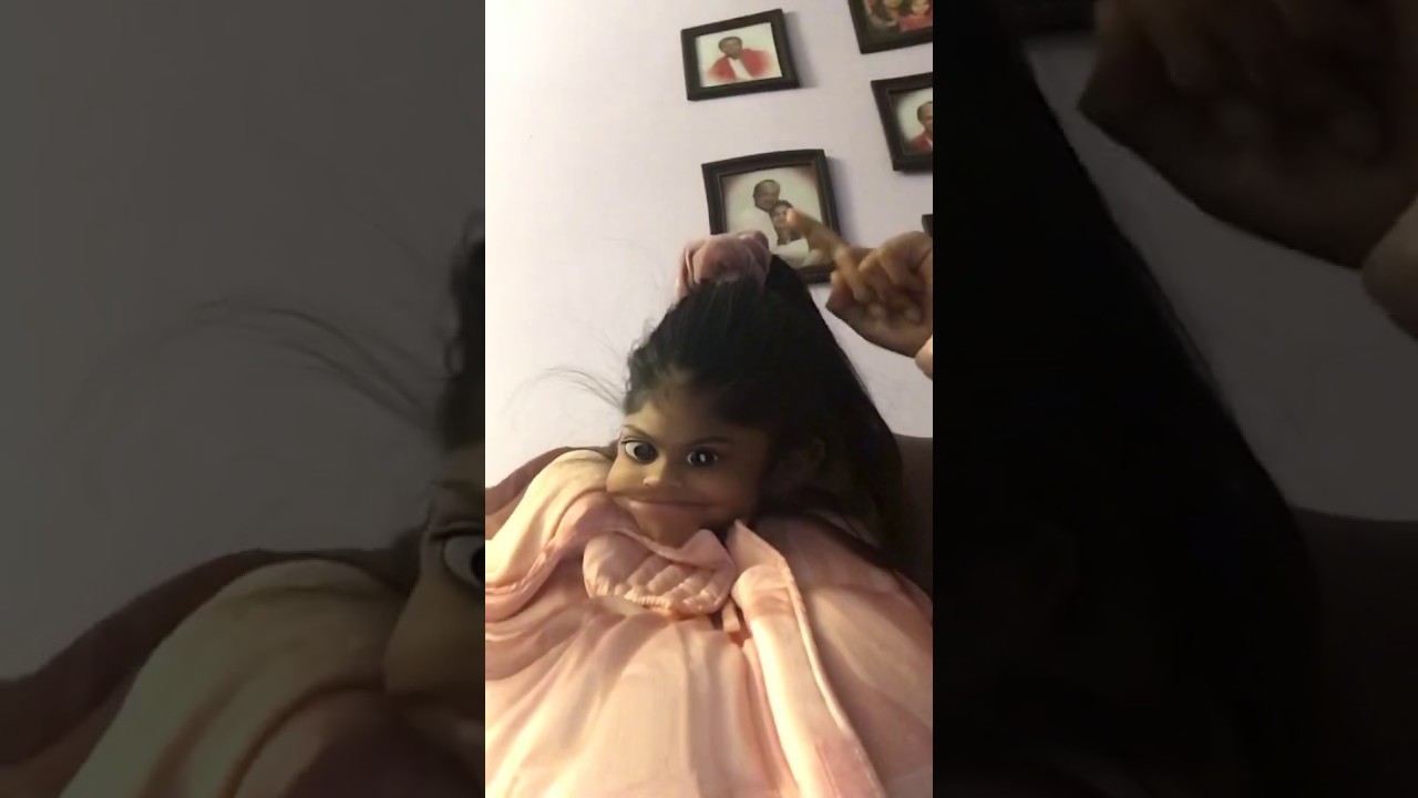 Felicia has a skrunchie in her hair