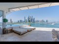 Inside a FIVE Palm Jumeirah Penthouse with private pool and Dubai Marina skyline view