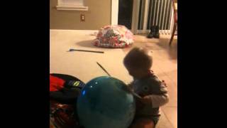 Declan drumming to Backyardigans