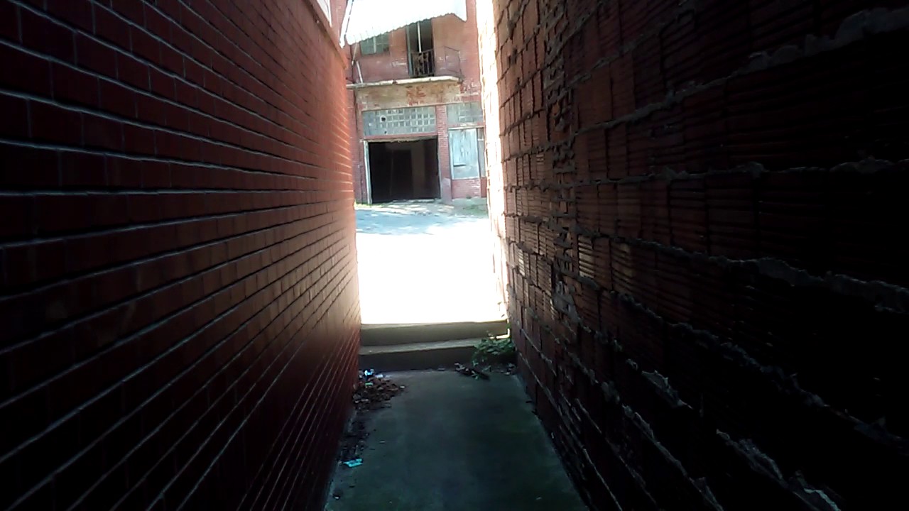 A Tunnel Between Building Ruins financial collapse blog