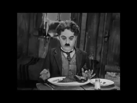 Sir Charlie Chaplin eating his shoe The Gold Rush