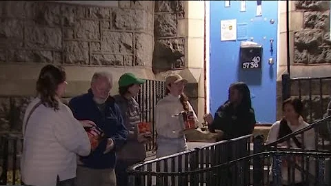 Volunteers preparing thousands of Thanksgiving meals for people in need