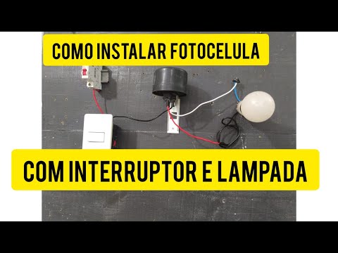 Vídeo: Como você conecta um interruptor de fotocélula?