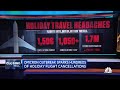 Omicron outbreak sparks hundreds of holiday flight cancellations