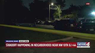 standoff happening in neighborhood near NW 10th and I-44