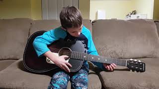 10 minutes after first time picking up a guitar