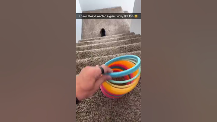 Giant Slinky Vs Stairs 🤯 #shorts