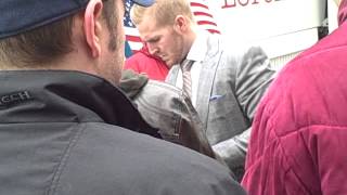 James Wisniewski of The Columbus Blue Jackets signing autographs