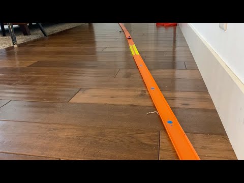 Cool hot wheel track with dominos.