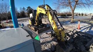 Mini X Ripping Out Concrete