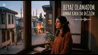 Beyaz olamadım amma kara da değilim