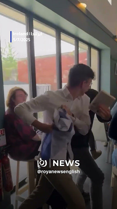 Pro-“Israeli” disrupts Palestinian liberation lecture by waving flag in protest