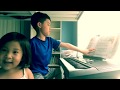 Jaden playing the piano. Jingle Bells at the end.