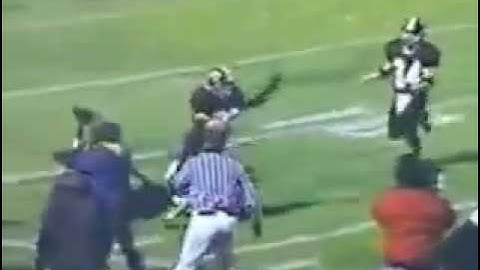 Football - Passing Plays: Line judge mechanic on run to sideline