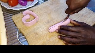 Try this new method of cooking sausage 😋 it's super fine// Chef Isaac254