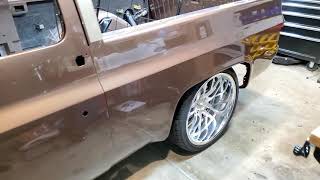 Behind the tail light fuel filler
