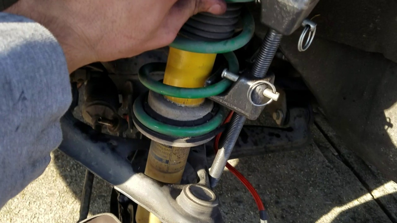 How to change 1999 miata front shock suspension strut YouTube