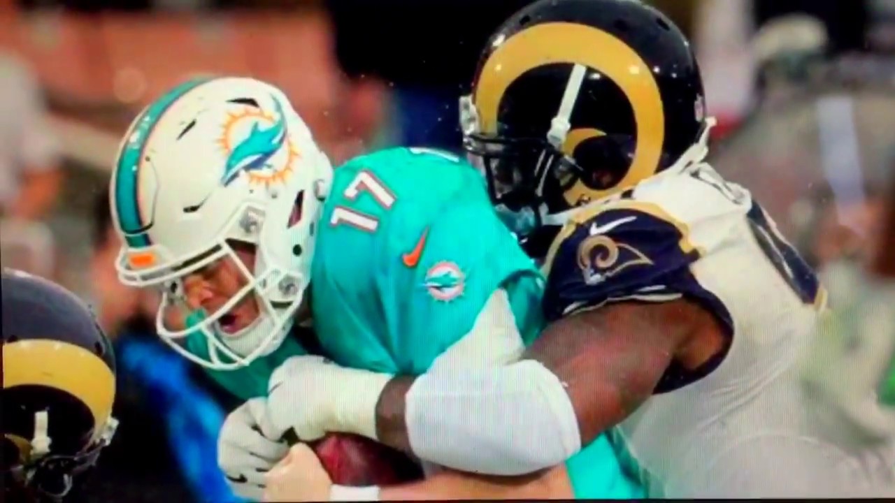 Keith Middlebrook, (R) Real Iron Man Signs Dominique Easley, LA Rams NFL Champion.