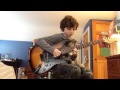9 year old boy playing holiday by green day on guitar