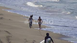 Two women jogging on the beach. | Stock Footage - Envato elements