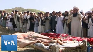 Prayers for Afghan Quake Dead Buried in Mass Grave