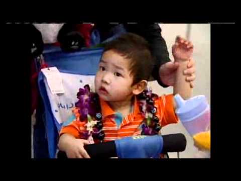 Two Families Celebrate Chinese New Year With Arrival Of Adopted Children