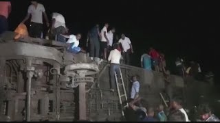 More than 200 killed and 900 hurt after 2 trains derail in India; hundreds still trapped in coaches