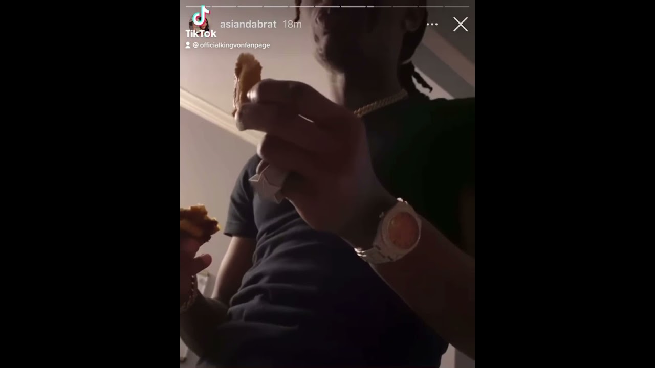 King Von talking to Asian Doll while she pulls his shorts