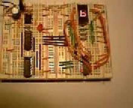 555 timer, 4 bit counter, 7 segment display